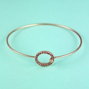 2/$12- ROSE CRYSTAL CIRCLE ROSE GOLDTONE BANGLE